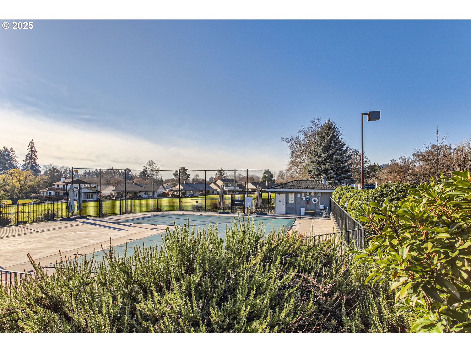 15655 Southwest 114th Court, Unit 10 Portland, OR 97224 - Photo 27 of 27 a view of a swimming pool and lake view