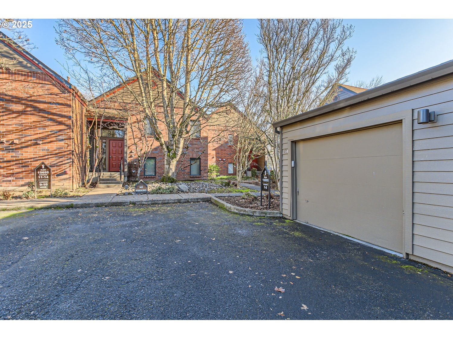 15655 Southwest 114th Court, Unit 10 Portland, OR 97224 - Photo 3 of 27 a view of a house with a yard