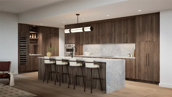 a kitchen with a table and chairs