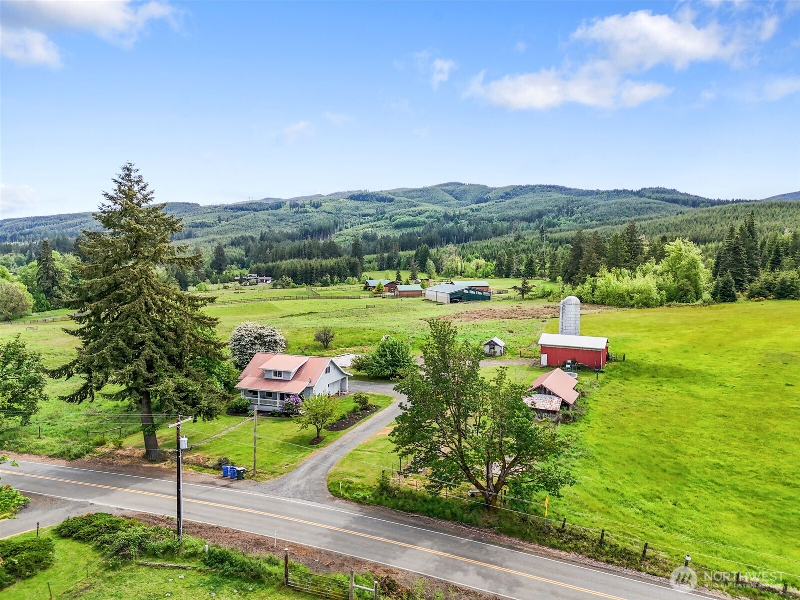 a view of a lake with a yard
