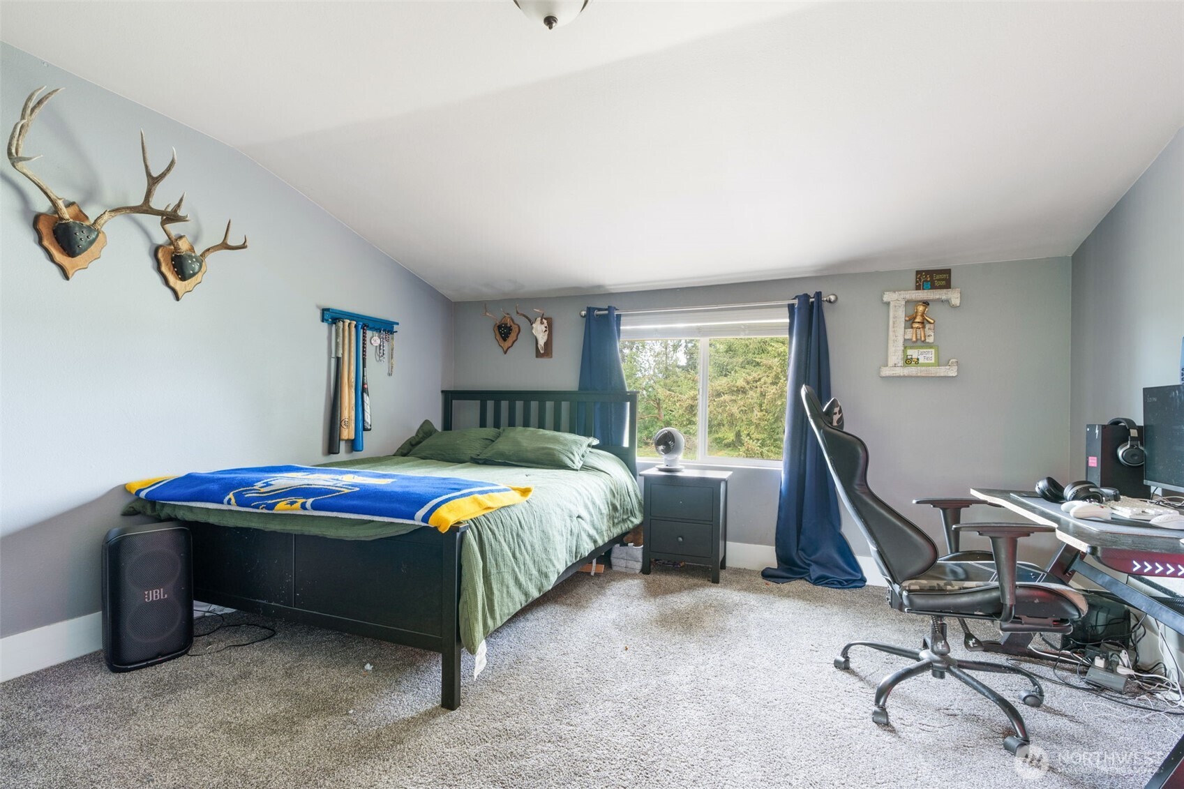 2163 Wildwood Road Curtis, WA 98538 - Photo 19 of 36 a bedroom with a bed and a table