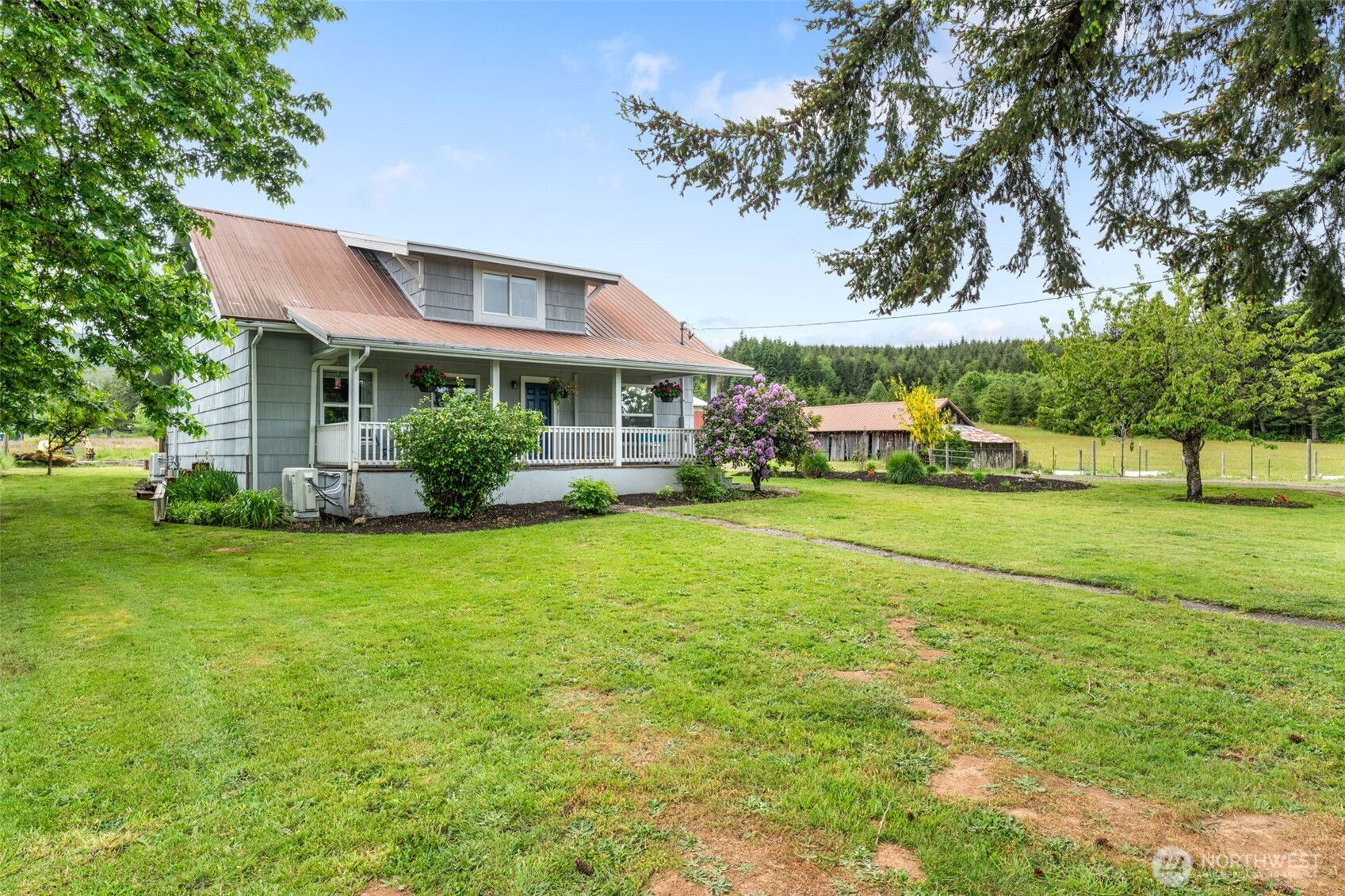 2163 Wildwood Road Curtis, WA 98538 - Photo 23 of 36 a front view of house with yard and green space