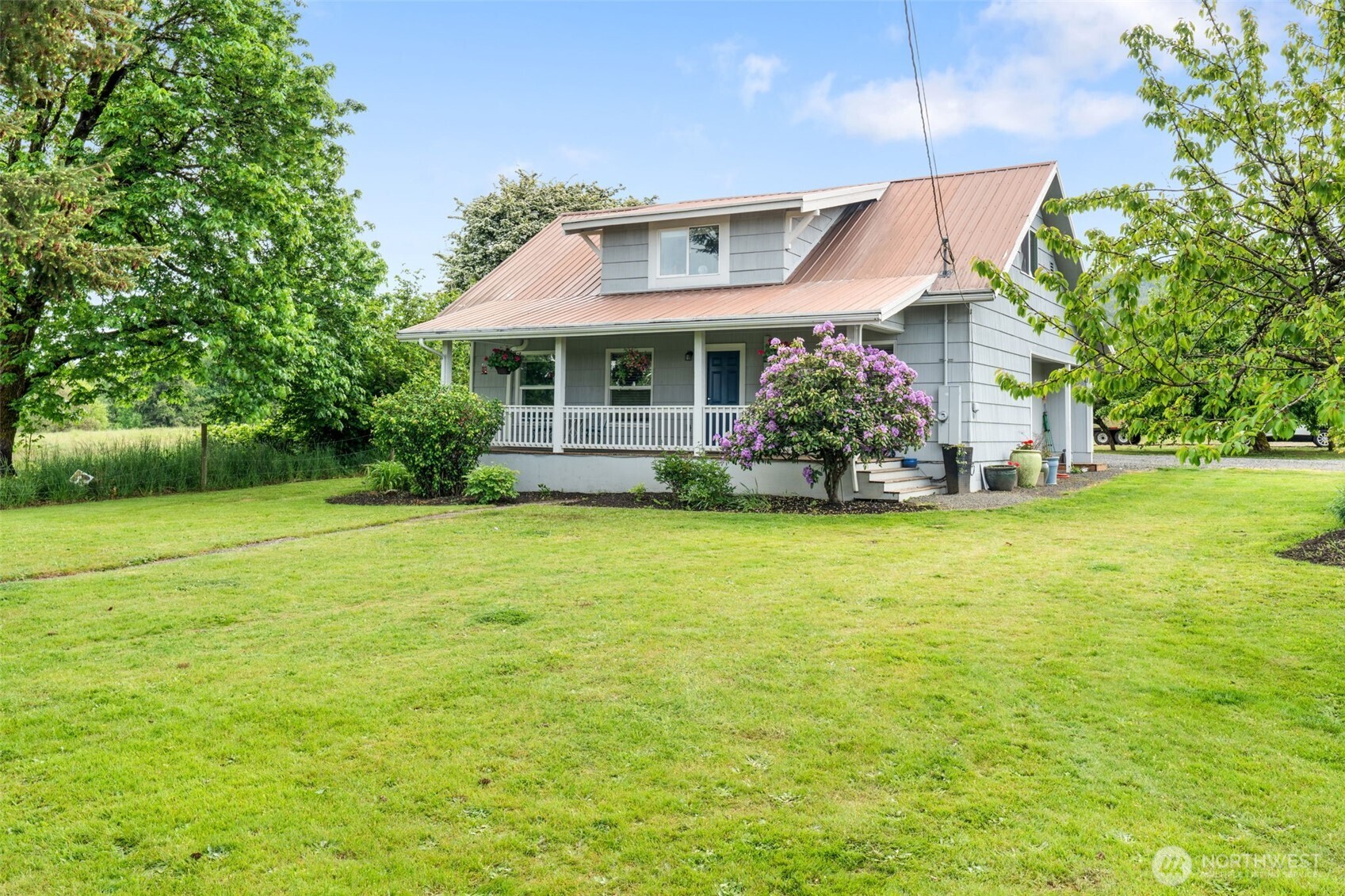 2163 Wildwood Road Curtis, WA 98538 - Photo 3 of 36 a front view of a house with garden