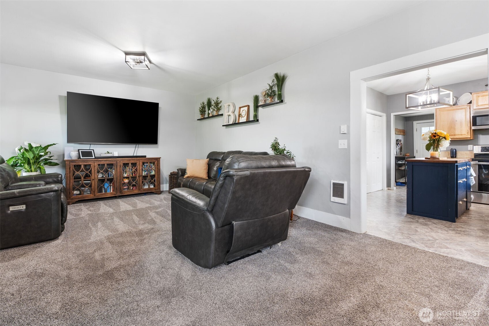 2163 Wildwood Road Curtis, WA 98538 - Photo 5 of 36 a living room with furniture and a flat screen tv