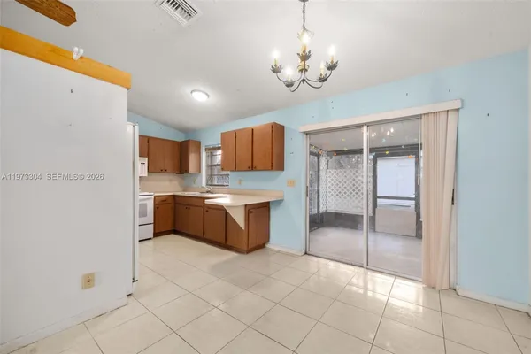 a spacious bathroom with a mirror vanity and a shower