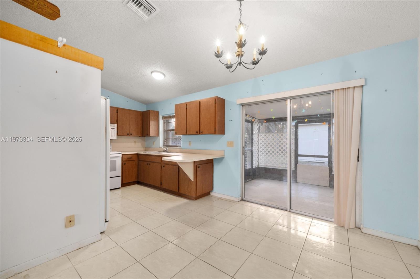 2067 North Terrapin Road Avon Park, FL 33825 - Photo 11 of 43 a spacious bathroom with a mirror vanity and a shower