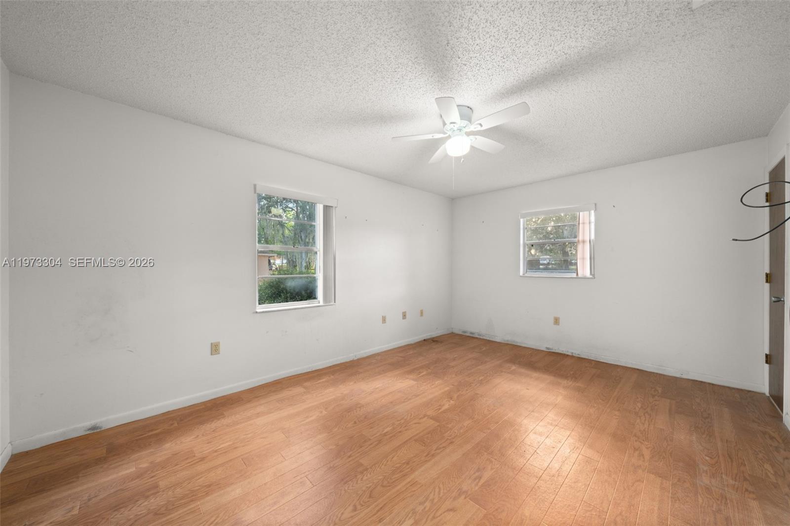 2067 North Terrapin Road Avon Park, FL 33825 - Photo 13 of 43 a view of an empty room with a window
