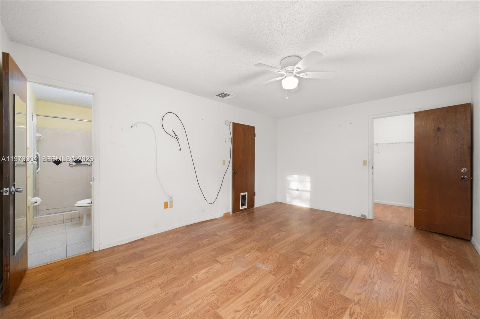 2067 North Terrapin Road Avon Park, FL 33825 - Photo 16 of 43 a view of empty room with a ceiling fan