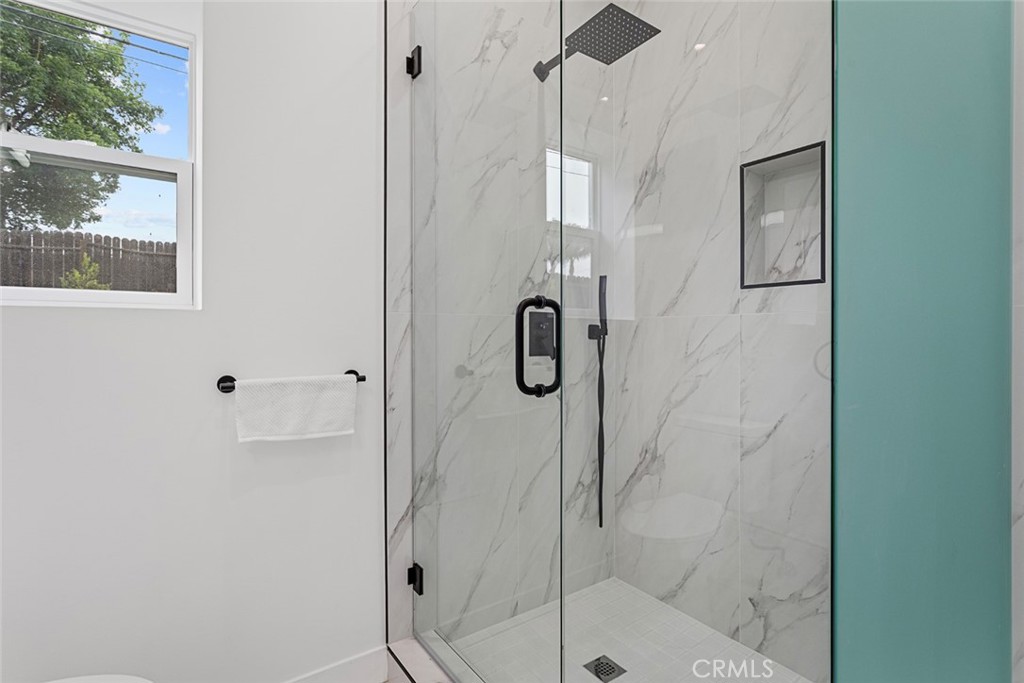 2162 Montgomery Road Thousand Oaks, CA 91360 - Photo 24 of 26 a bathroom with a shower