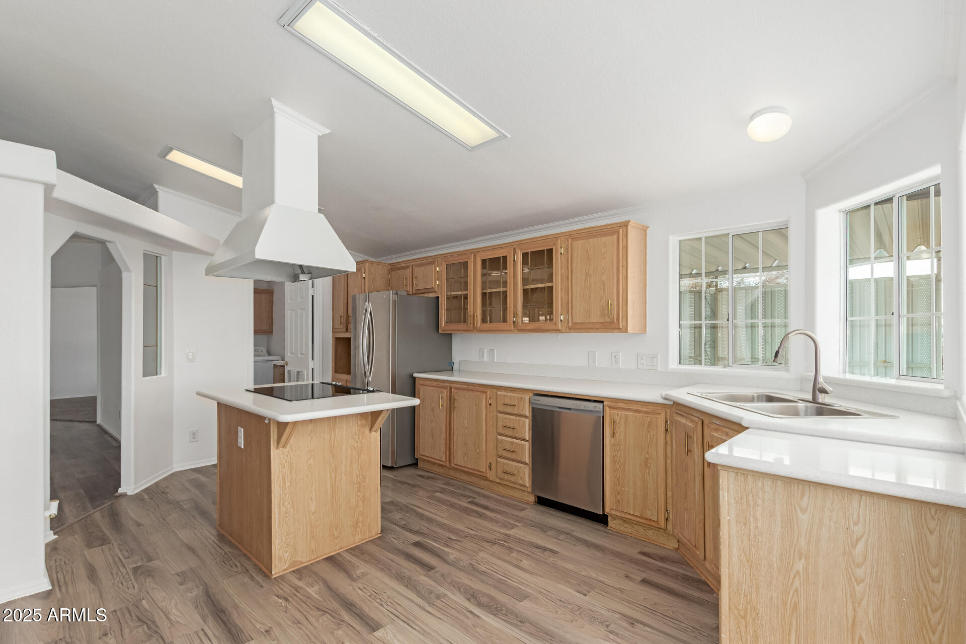 2311 South Descanso Road Apache Junction, AZ 85119 - Photo 12 of 35 a kitchen with a sink stove and cabinets