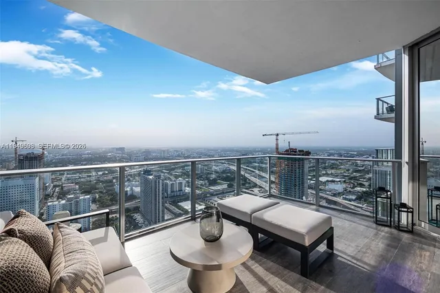 a view of a lobby with black carpet