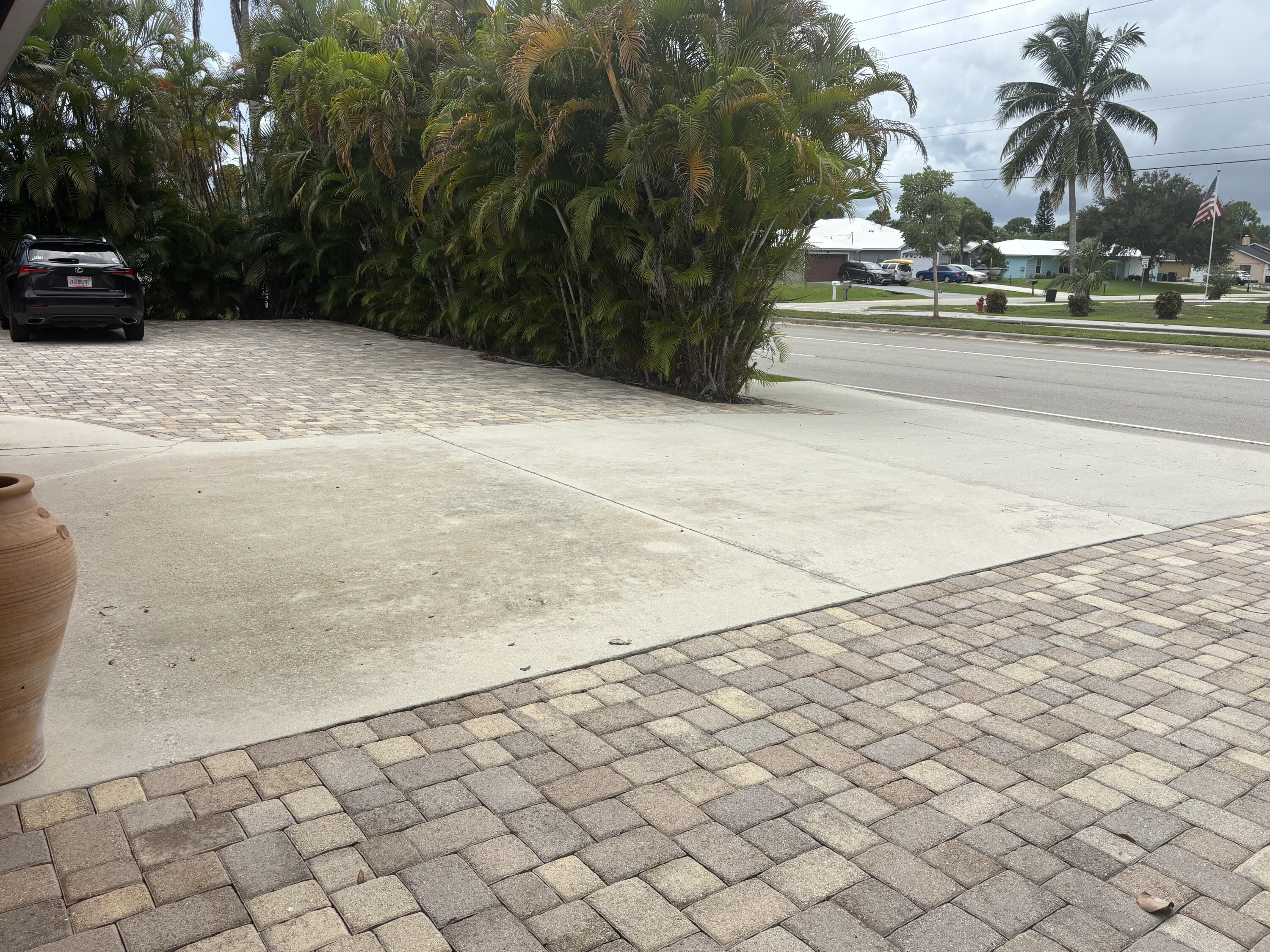 1257 Southeast Airoso Boulevard, Unit B Port St. Lucie, FL 34983 - Photo 5 of 12 a view of street with trees