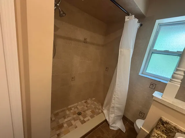 a bathroom with a sink and toilet