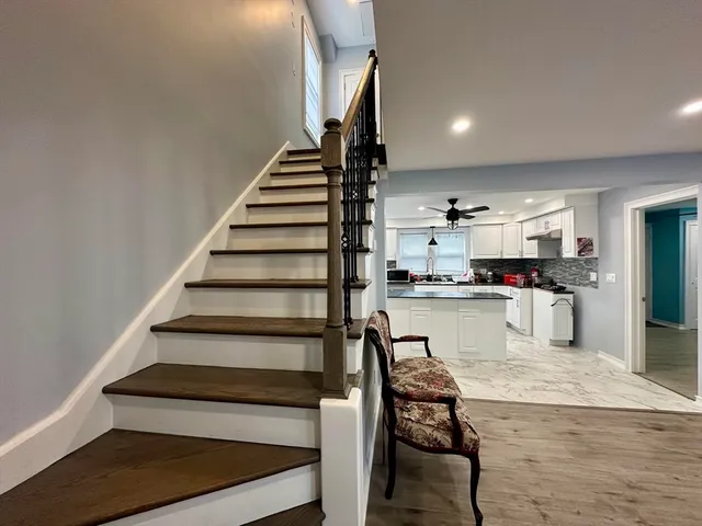 a view of kitchen with dining table and chairs