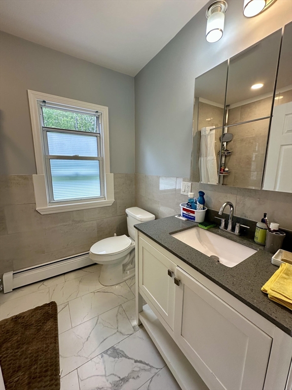 240 Russellville Road Westfield, MA 01085 - Photo 12 of 19 a bathroom with a granite countertop sink toilet and a mirror