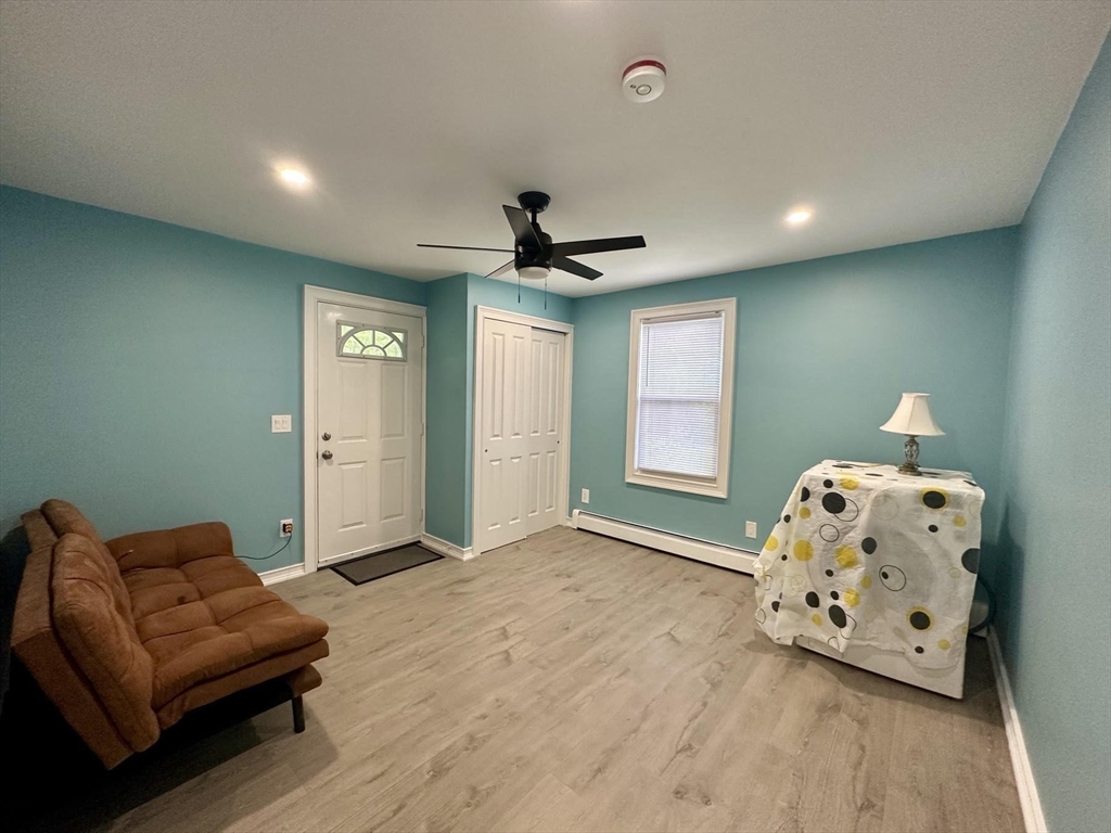 240 Russellville Road Westfield, MA 01085 - Photo 14 of 19 a living room with furniture and a window