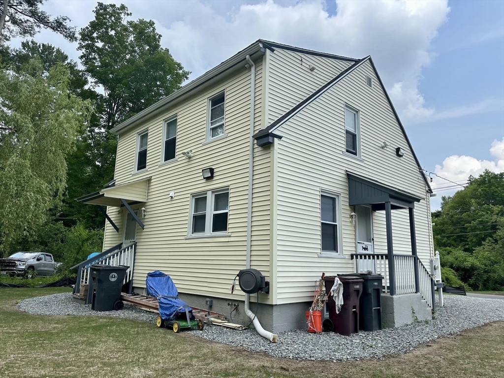 240 Russellville Road Westfield, MA 01085 - Photo 19 of 19 a view of a house with a patio