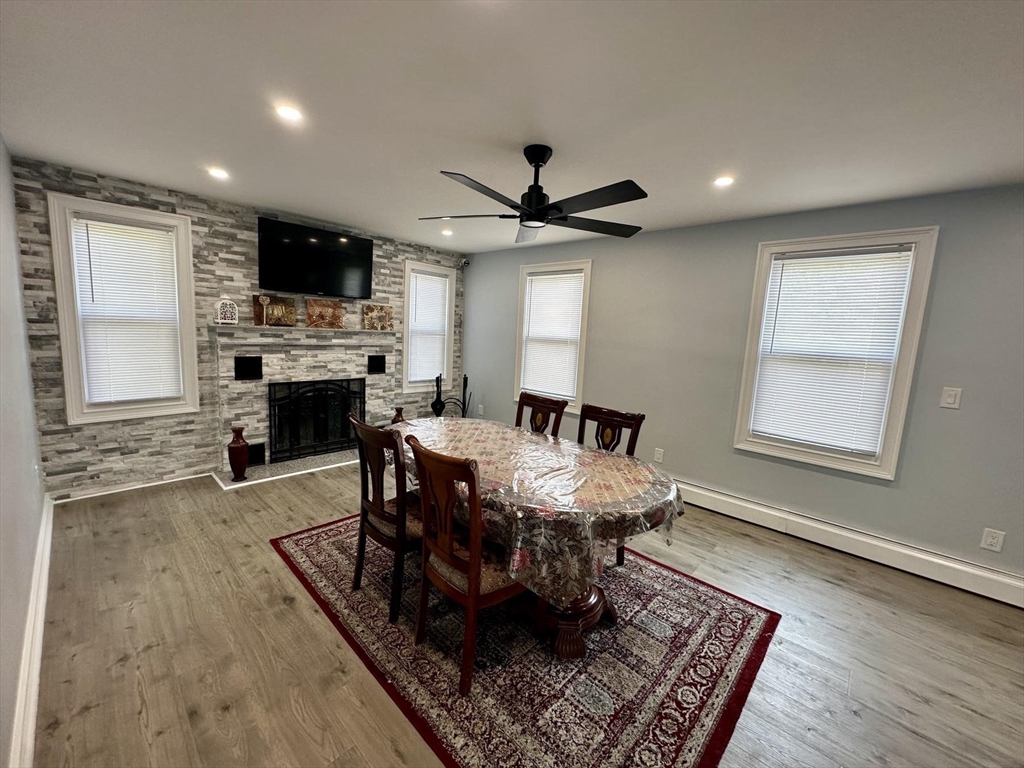 240 Russellville Road Westfield, MA 01085 - Photo 5 of 19 a living room with furniture fireplace and flat screen tv
