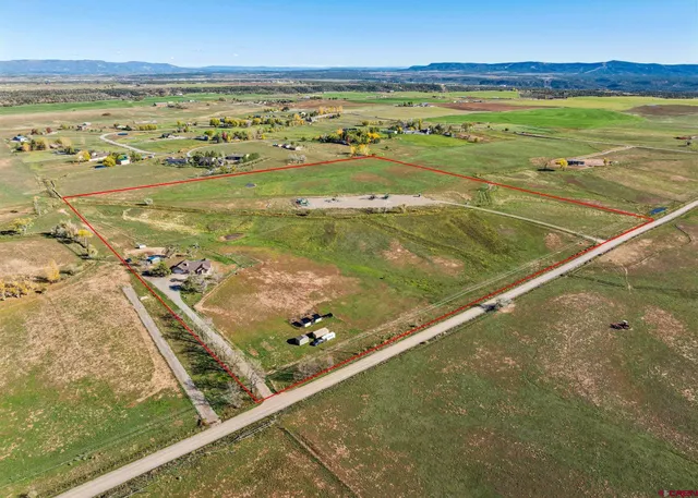 a view of an ocean and a mountain