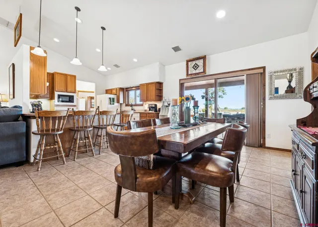a view of a dining room with furniture