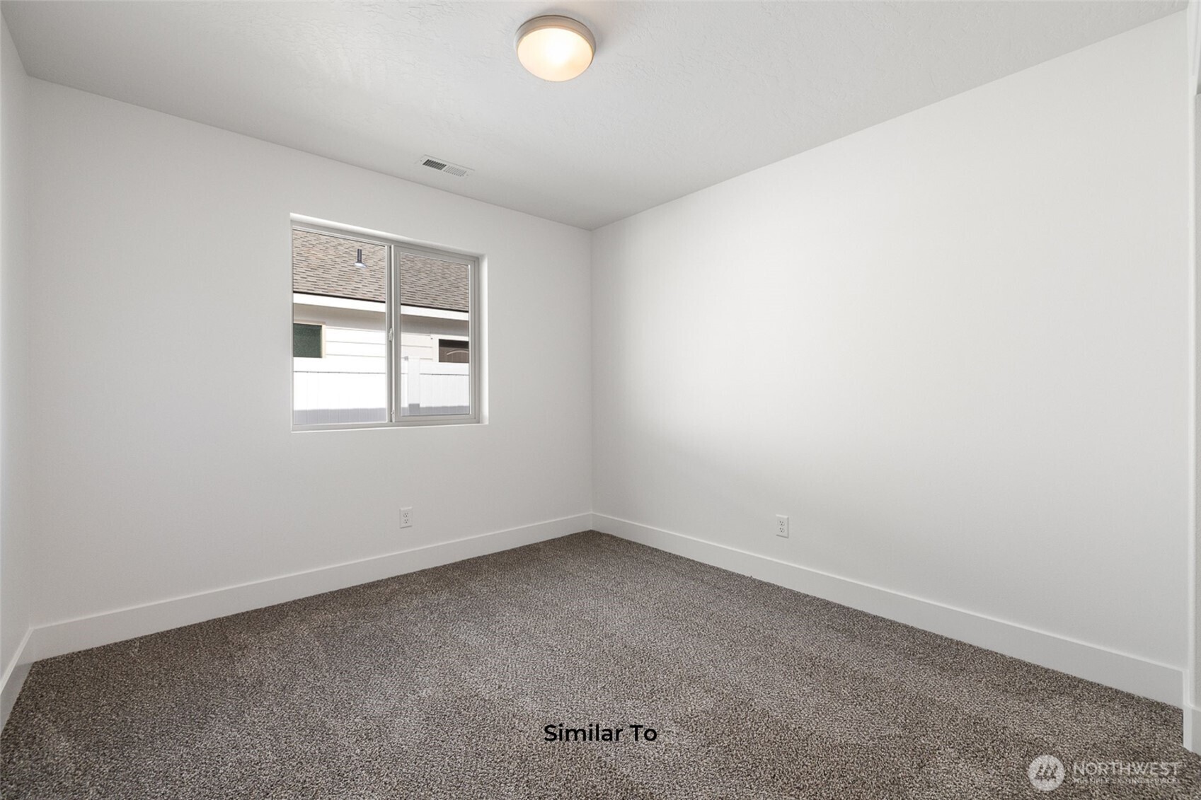 4251 Sandy Street Moses Lake, WA 98837 - Photo 16 of 19 an empty room with a window