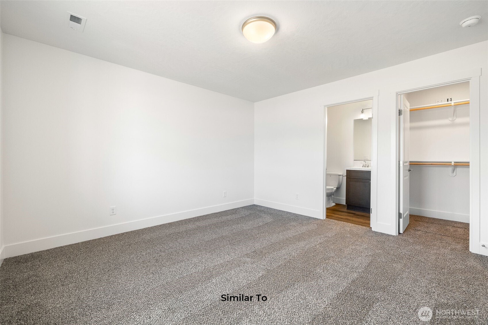 4251 Sandy Street Moses Lake, WA 98837 - Photo 5 of 19 an empty room with closet and a window