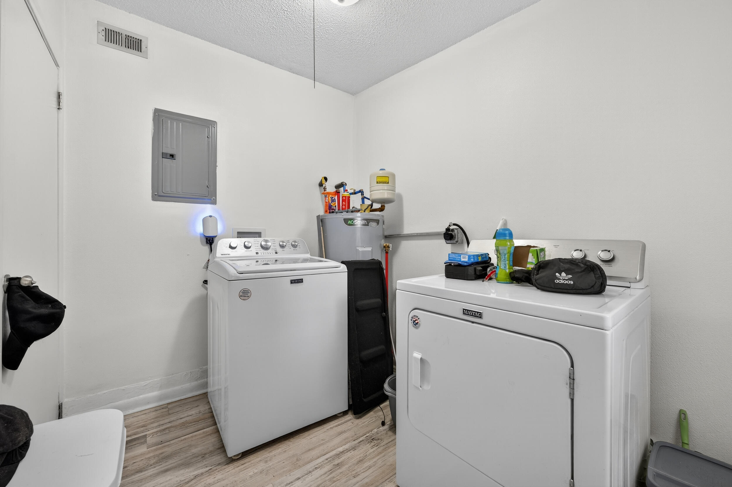 313 Brackin Street, Unit A Crestview, FL 32539 - Photo 14 of 28 a utility room with dryer and washer