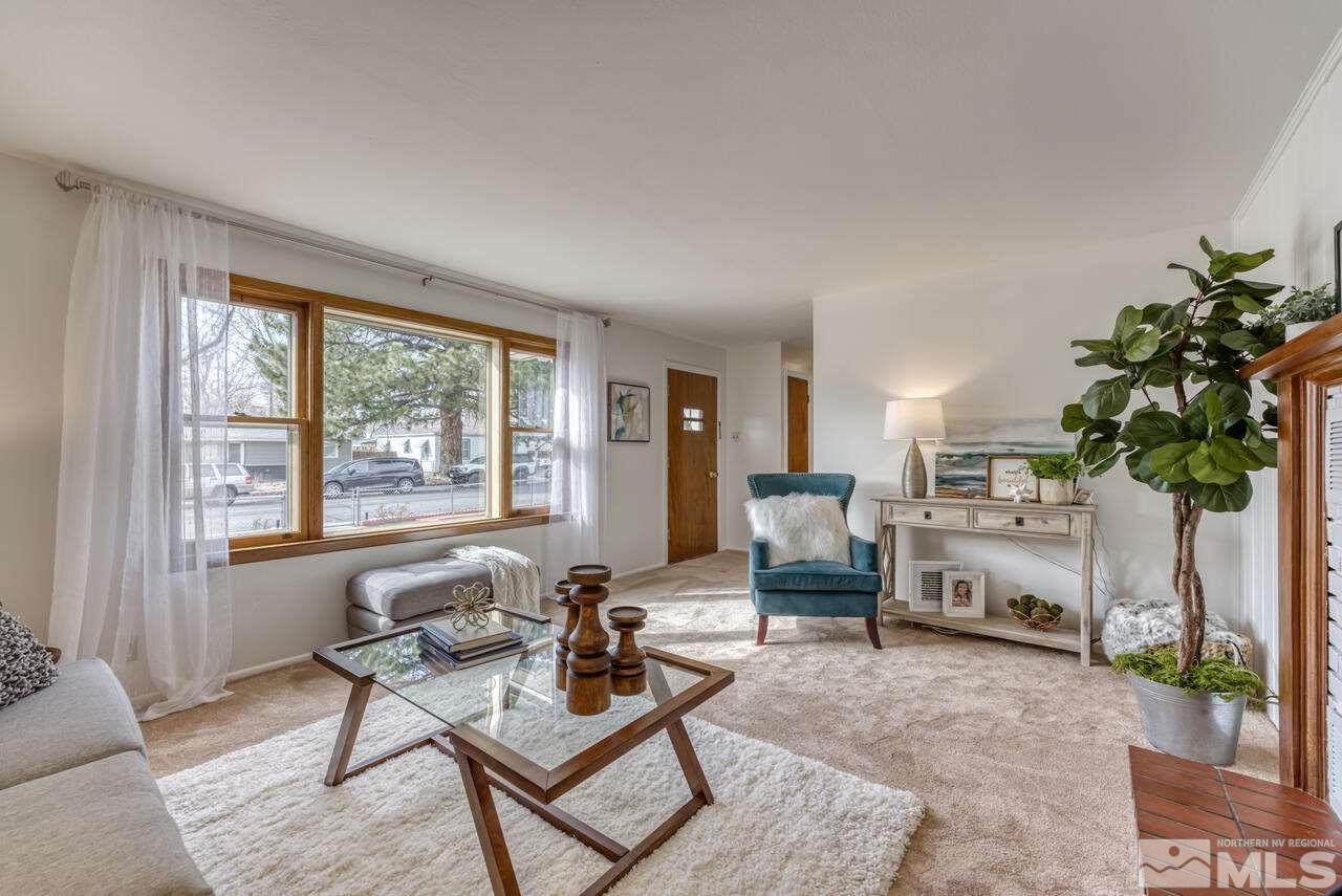 990 Yori Avenue Reno, NV 89502 - Photo 13 of 40 a living room with furniture and a large window