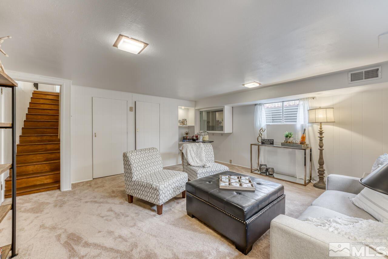 990 Yori Avenue Reno, NV 89502 - Photo 40 of 40 a living room with furniture and a wooden floor