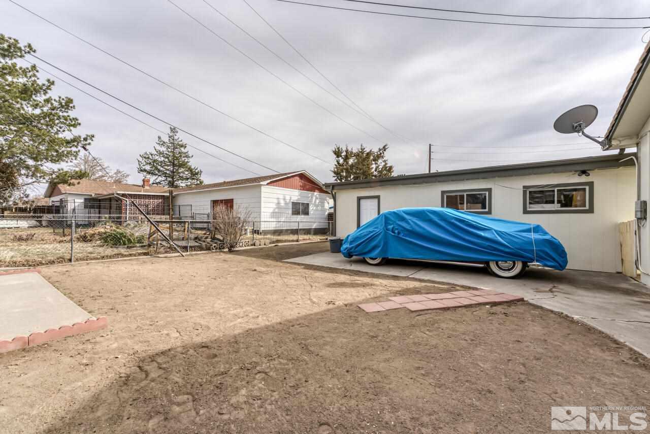990 Yori Avenue Reno, NV 89502 - Photo 7 of 40 a car parked in front of house