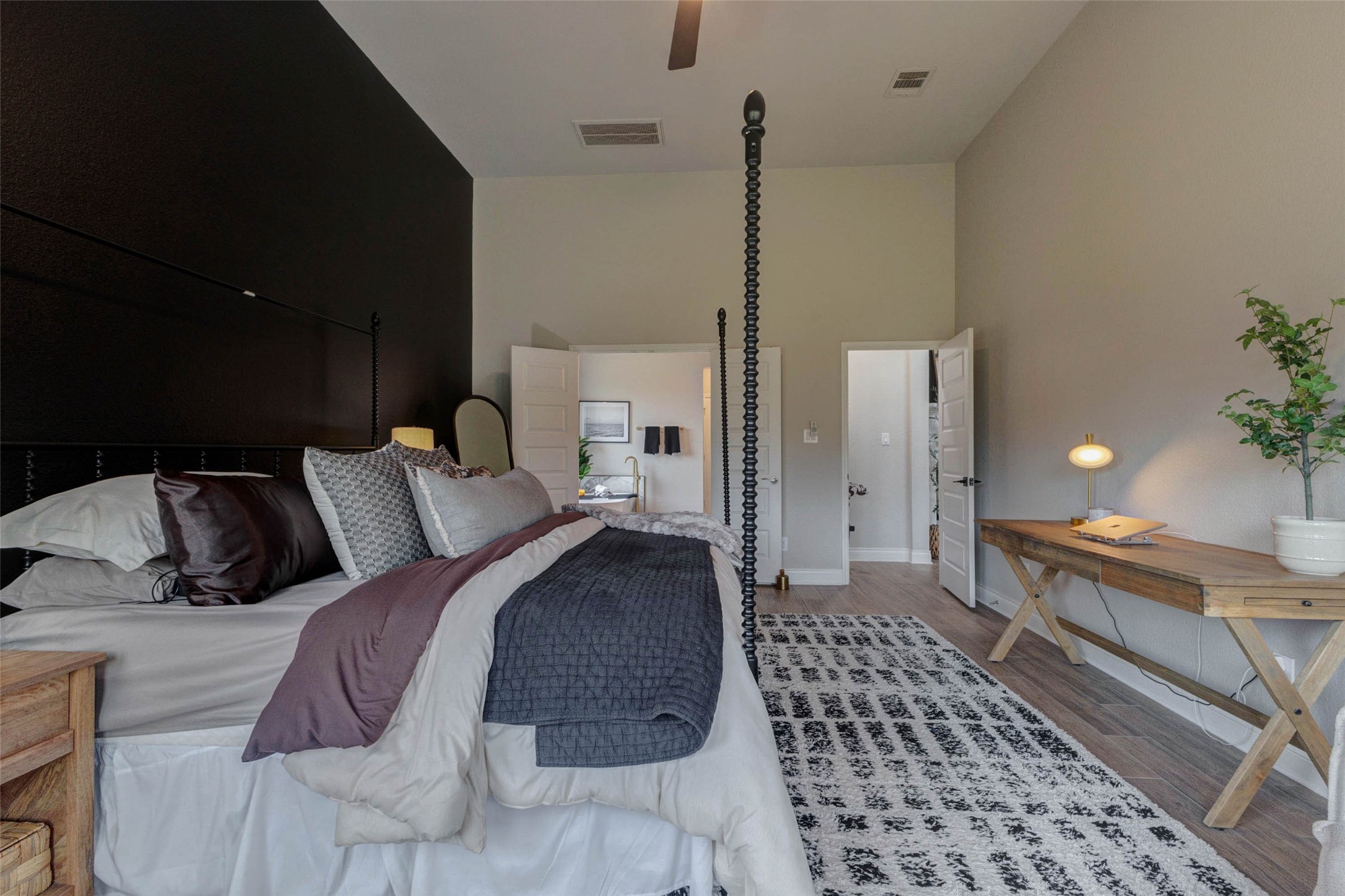 4303 Tupelo Leaf Court Manvel, TX 77578 - Photo 31 of 50 a bed room with a bed and a lamp
