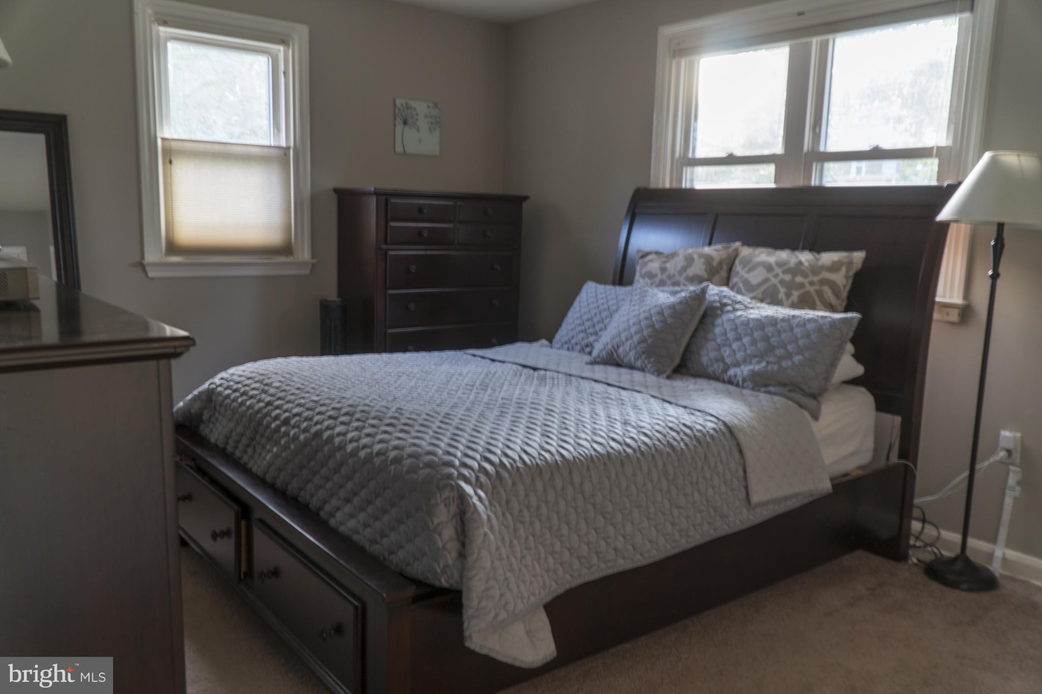 Main Bedroom - Two Closets & Convenient Half Bath