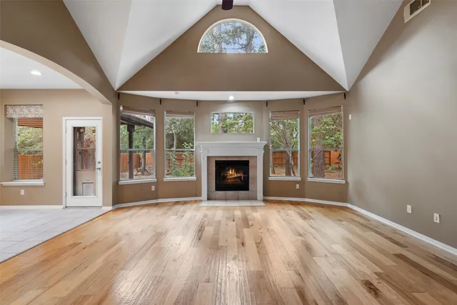 a view of an entryway with wooden floor