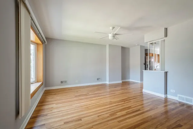 a view of a livingroom with wooden floor