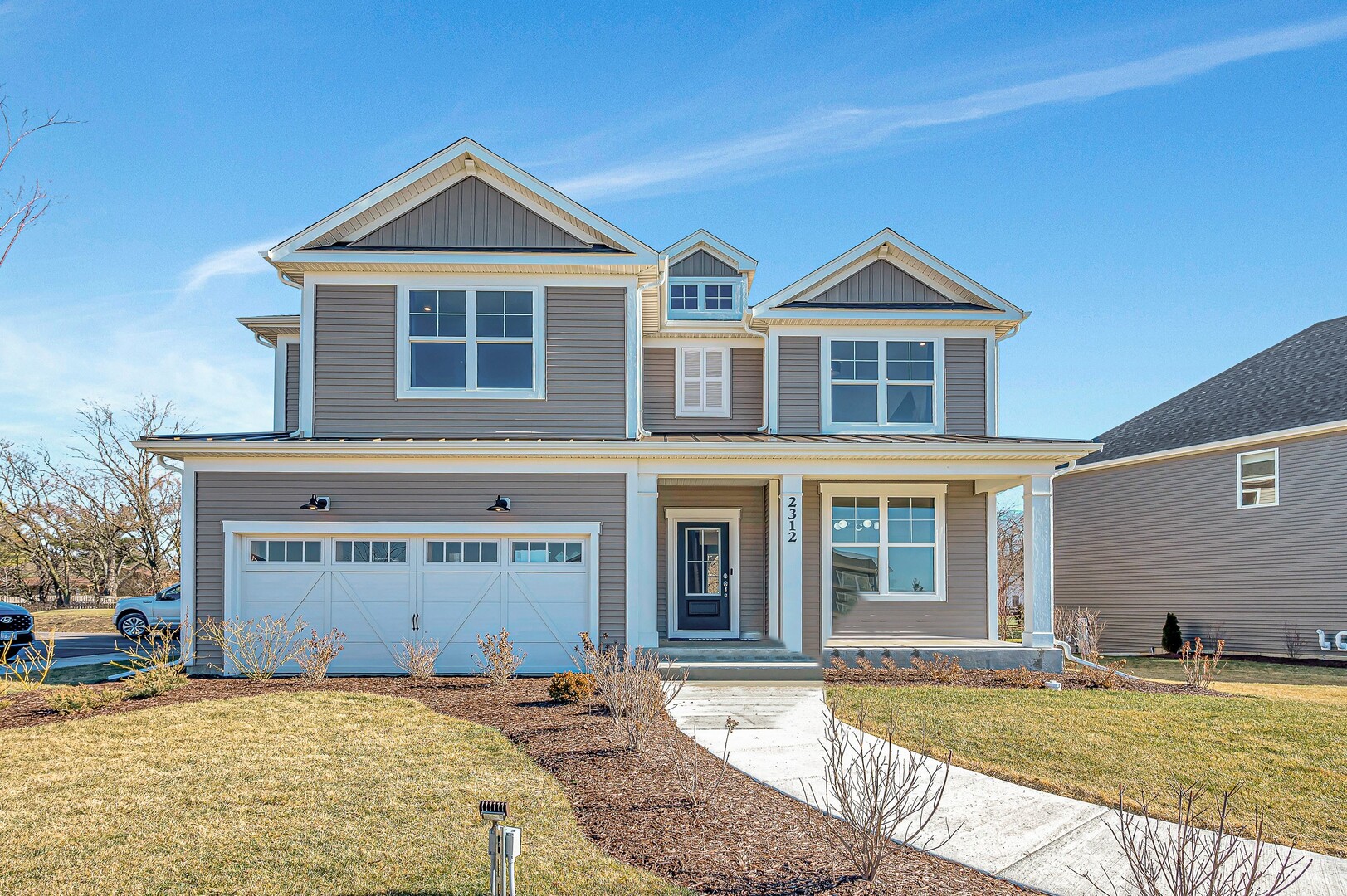 560 Redtop Way Bolingbrook, IL 60490 - Photo 1 of 1 a front view of a house with a yard