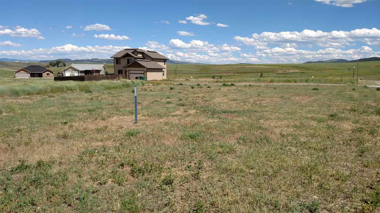 345 Little Bend Road Hayden, CO 81639 - Photo 3 of 8 a view of a lake with a yard
