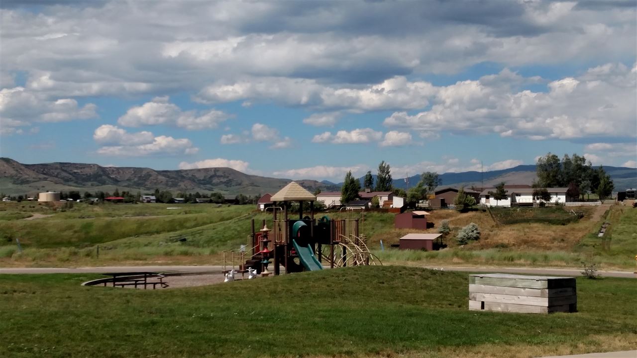 345 Little Bend Road Hayden, CO 81639 - Photo 8 of 8 a view of a lake with a yard