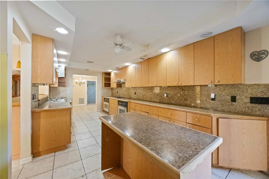860 South Beneva Road Sarasota, FL 34232 - Photo 11 of 64 a kitchen with stainless steel appliances granite countertop a sink counter space and cabinets