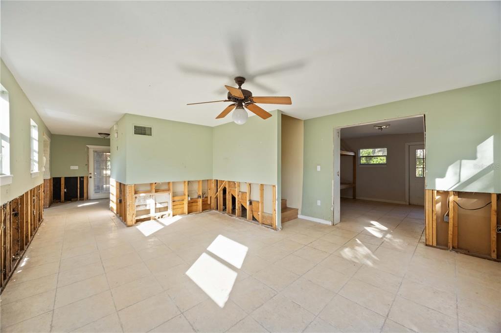 860 South Beneva Road Sarasota, FL 34232 - Photo 16 of 64 a view of a livingroom with furniture and staircase