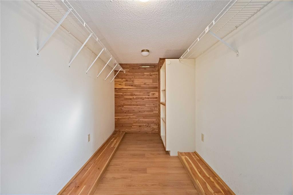 860 South Beneva Road Sarasota, FL 34232 - Photo 24 of 64 a view of a hallway with wooden floor and entryway