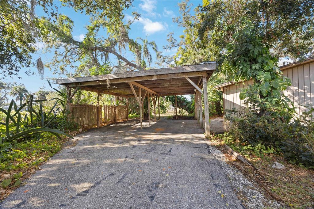 860 South Beneva Road Sarasota, FL 34232 - Photo 32 of 64 a view of a barn with a tree