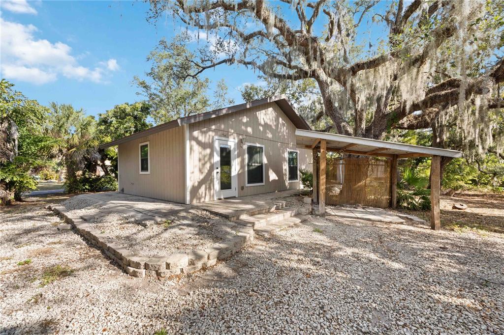 860 South Beneva Road Sarasota, FL 34232 - Photo 53 of 64 a view of a house with a yard