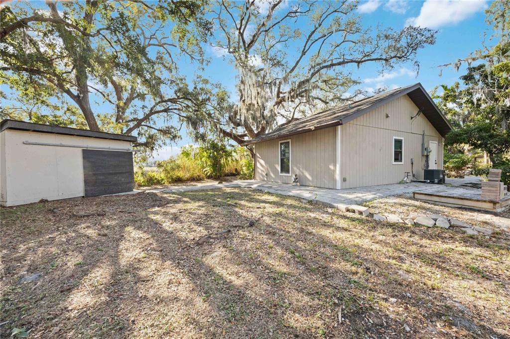 860 South Beneva Road Sarasota, FL 34232 - Photo 56 of 64 a house with a tree in front of it