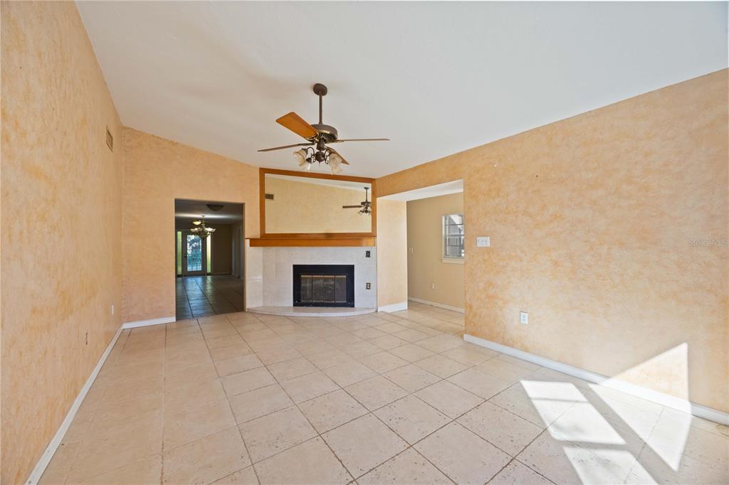 860 South Beneva Road Sarasota, FL 34232 - Photo 6 of 64 a view of an empty room with chandelier fan