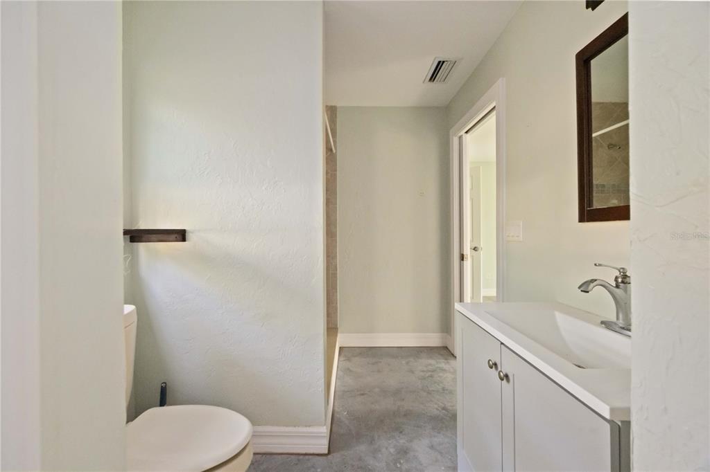 860 South Beneva Road Sarasota, FL 34232 - Photo 61 of 64 a bathroom with a sink a toilet and shower