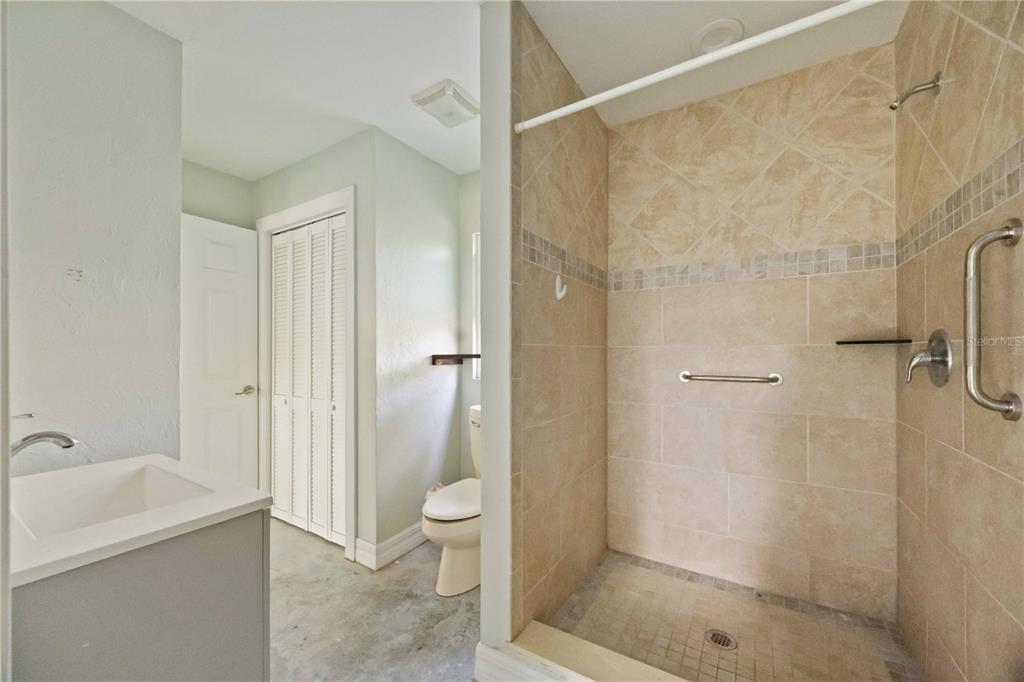 860 South Beneva Road Sarasota, FL 34232 - Photo 63 of 64 a bathroom with a sink a toilet and shower