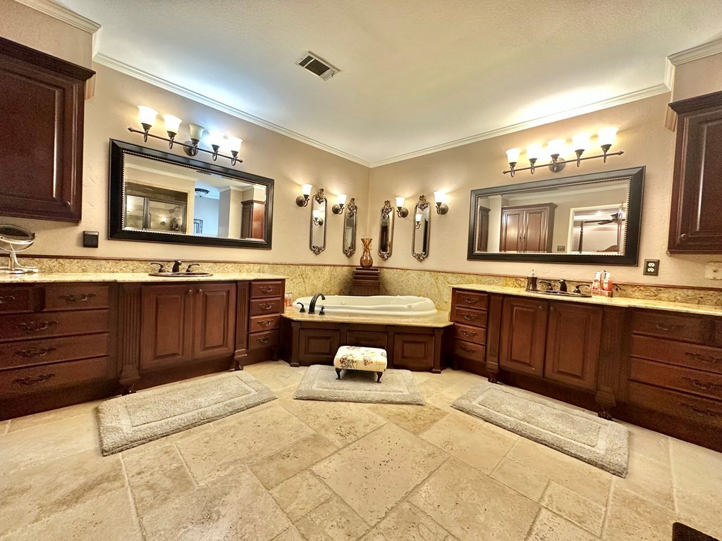 3405 Bethlehem Road Hudson, TX 75904 - Photo 12 of 41 a large bathroom with a sink and a large mirror