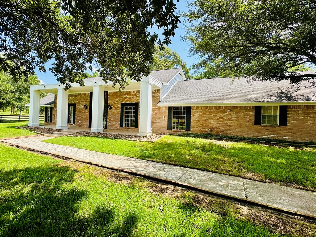 3405 Bethlehem Road Hudson, TX 75904 - Photo 4 of 41 a front view of a house with a yard