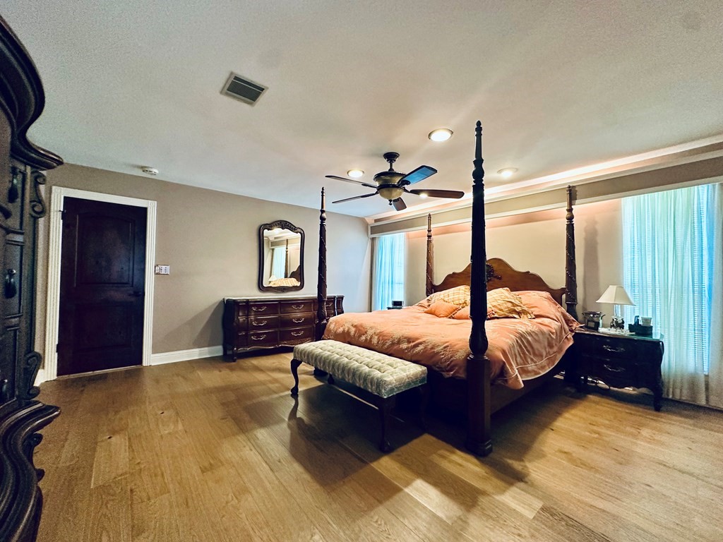 3405 Bethlehem Road Hudson, TX 75904 - Photo 10 of 41 a bedroom with a bed mirror and window