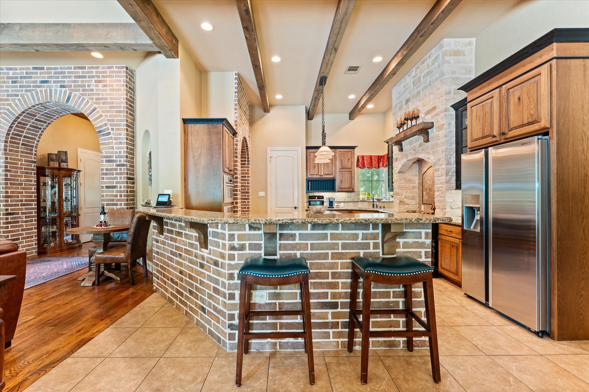 28422 Quiet Way Magnolia, TX 77355 - Photo 10 of 48 Brick surround on breakfast bar! No scuffed walls here!